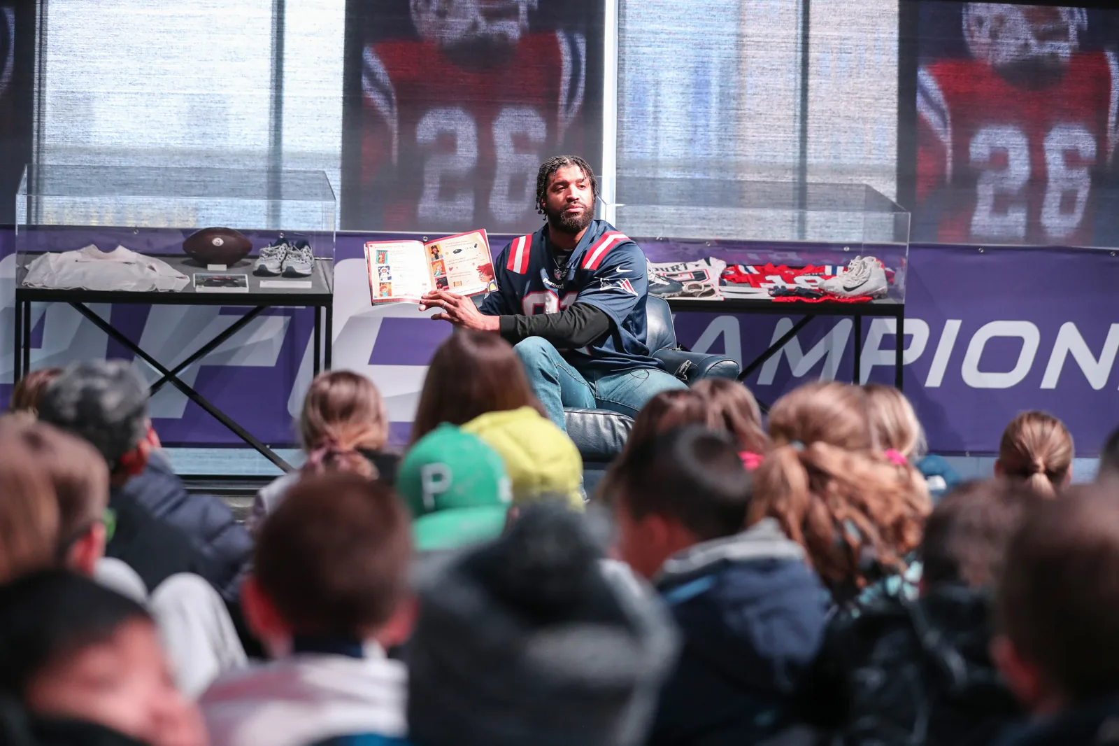 A child reading at a Wisenstar literacy event